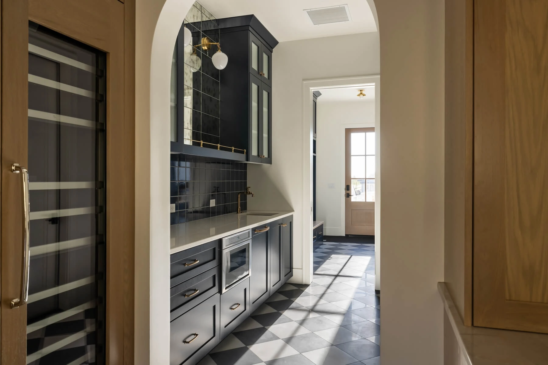 Tiled kitchen in custom designed kitchen