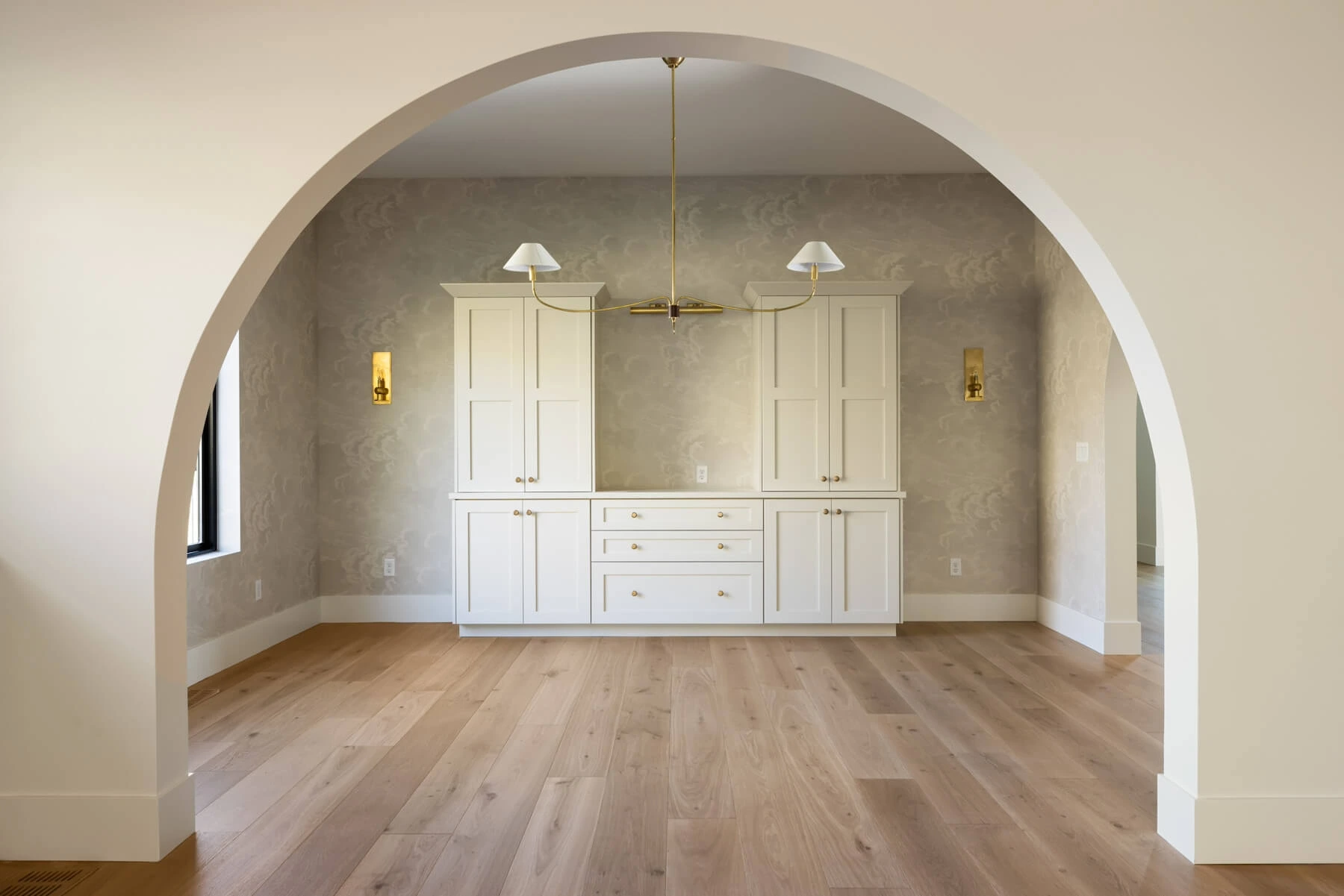 Arched walkway in designer home in Eagle Idaho
