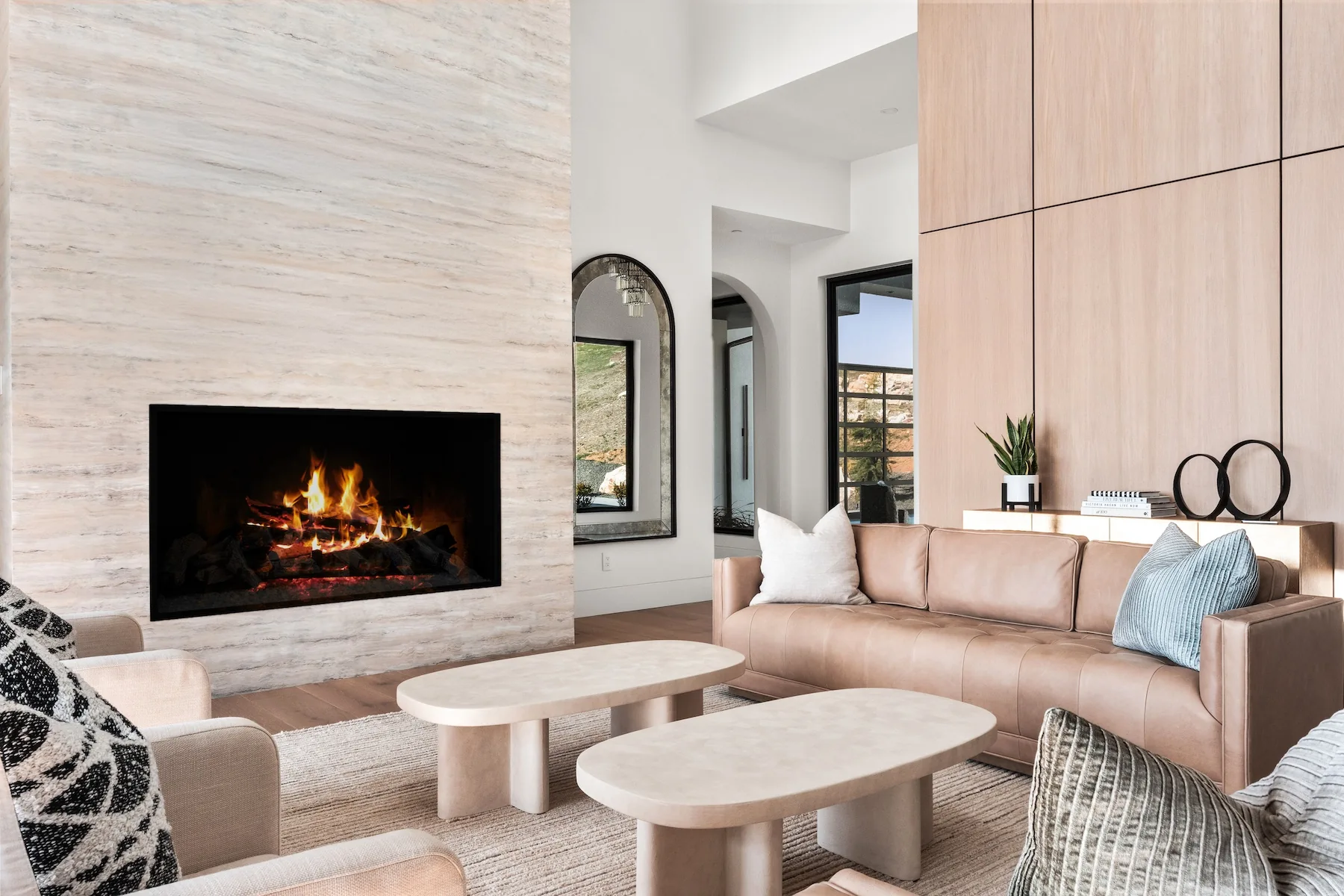 Modern fireplace with leather couch and fireplace in living room