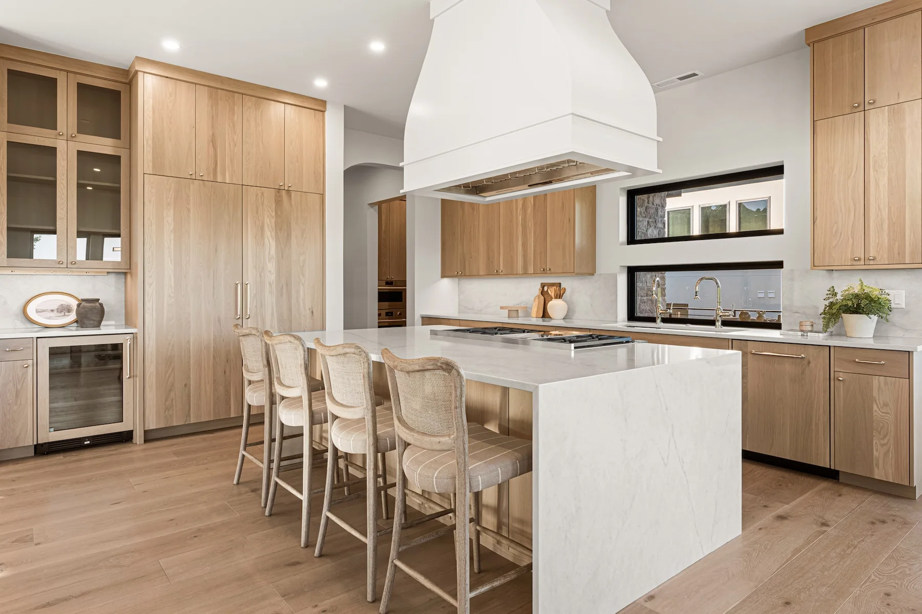 White marble island in modern kitchen